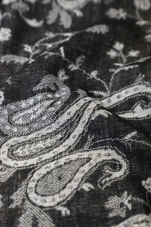 fabric with paisley vine floral pattern and textile texture background
