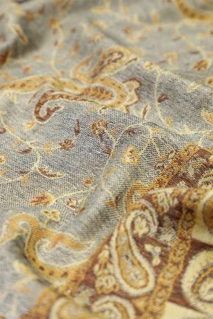 fabric with paisley vine floral pattern and textile texture background