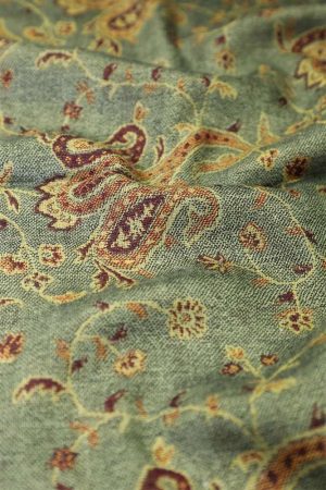 fabric with paisley vine floral pattern and textile texture background
