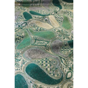 fabric detail of emerald green metallic pashmina shawl