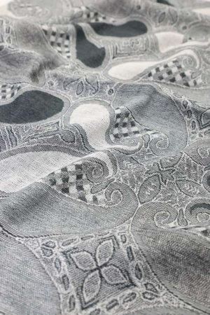 fabric detail of grey multi color paisley pashmina