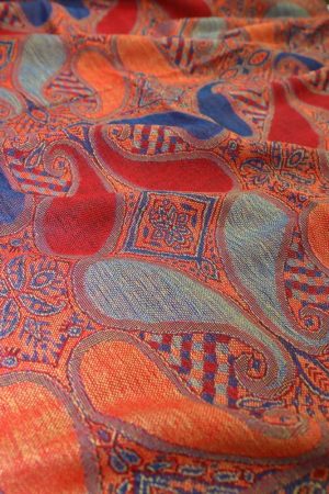 fabric detail of red blue multi color paisley pashmina