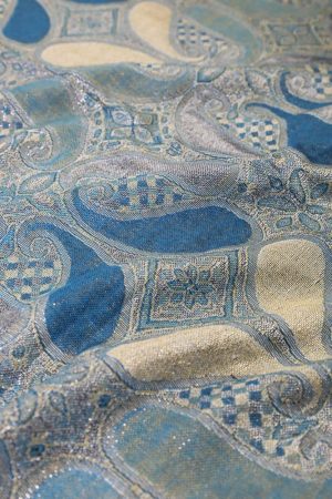 fabric detail of turquoise metallic pashmina shawl